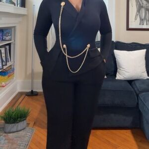 Sophisticated Black Jumpsuit with Gold Chain Accent